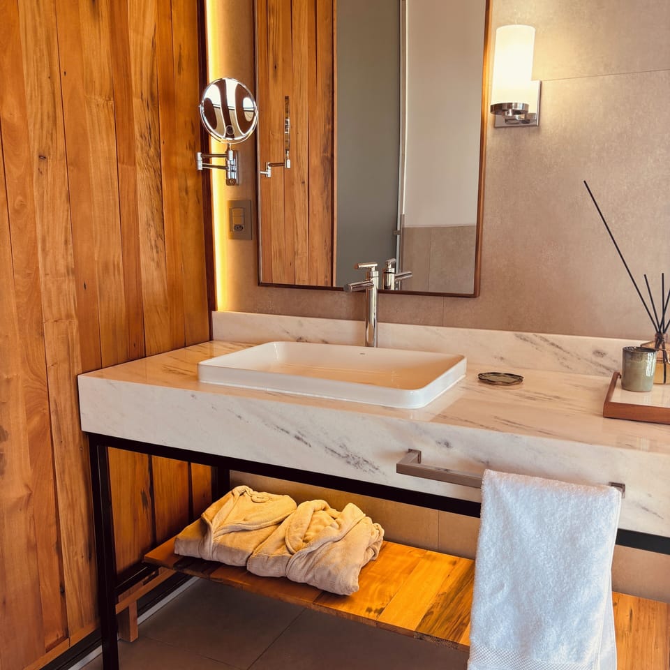 Luxury Double Room, Mountain View | Bathroom | Separate tub and shower, hair dryer, slippers, bidet