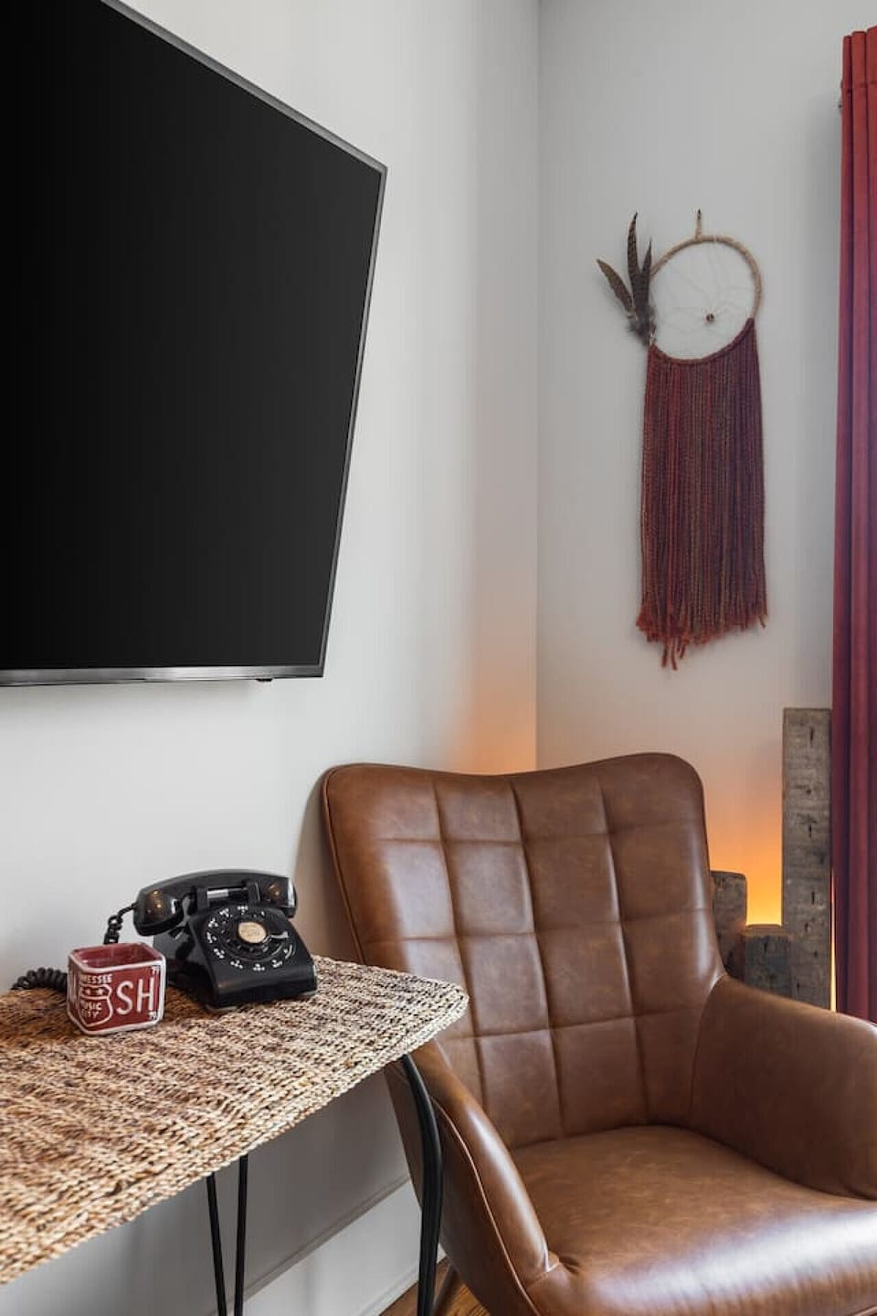 Spacious living room with queen pull-out couch and a Smart TV for your entertainment. Enjoy your morning coffee with plenty of natural light.
