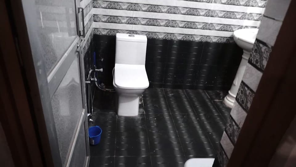 Shower, designer toiletries, towels, soap