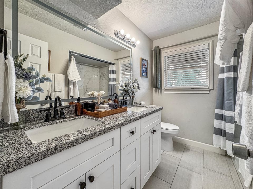 Bathroom is fully stocked with all you need. Makeup pads and q-tips included.