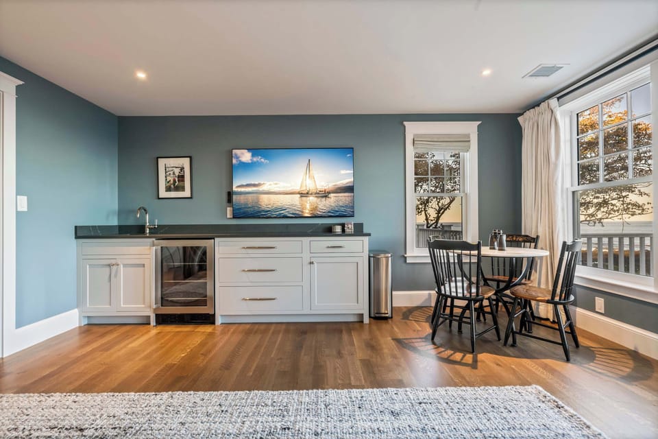 Bright upstairs lounge and TV with balcony seating