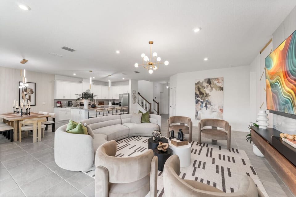 LIVING ROOM: 85` Smart TV. #Disney #Parks #kingdom #springs #Lake #resort #Apartment #Vacation #Rental #waterpark #Kissimmee #Orlando #universal #citywalk #Solara #FlowRide #surfsimulator