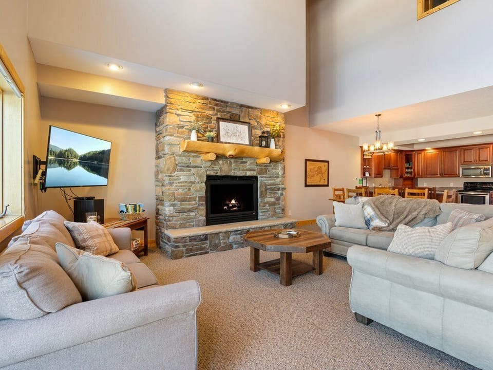 Living Room features an open layout connecting living, dining and kitchen spaces perfectly.
