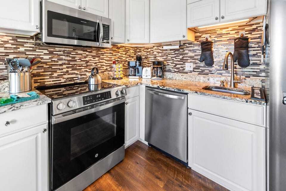 Beautiful Fully Equipped Kitchen with Stainless Appliances