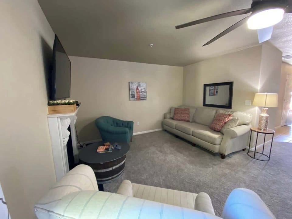 Living room with fireplace and flat panel tv