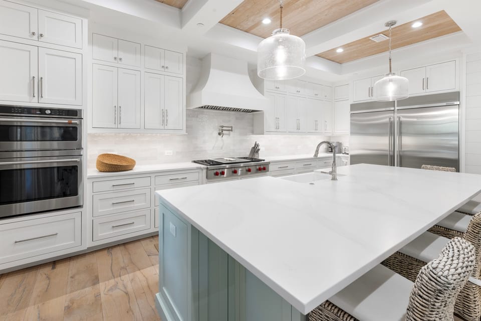 Your dream kitchen awaits with professional-grade appliances, gleaming quartz counters, and a stunning island perfect for morning coffee or culinary adventures.