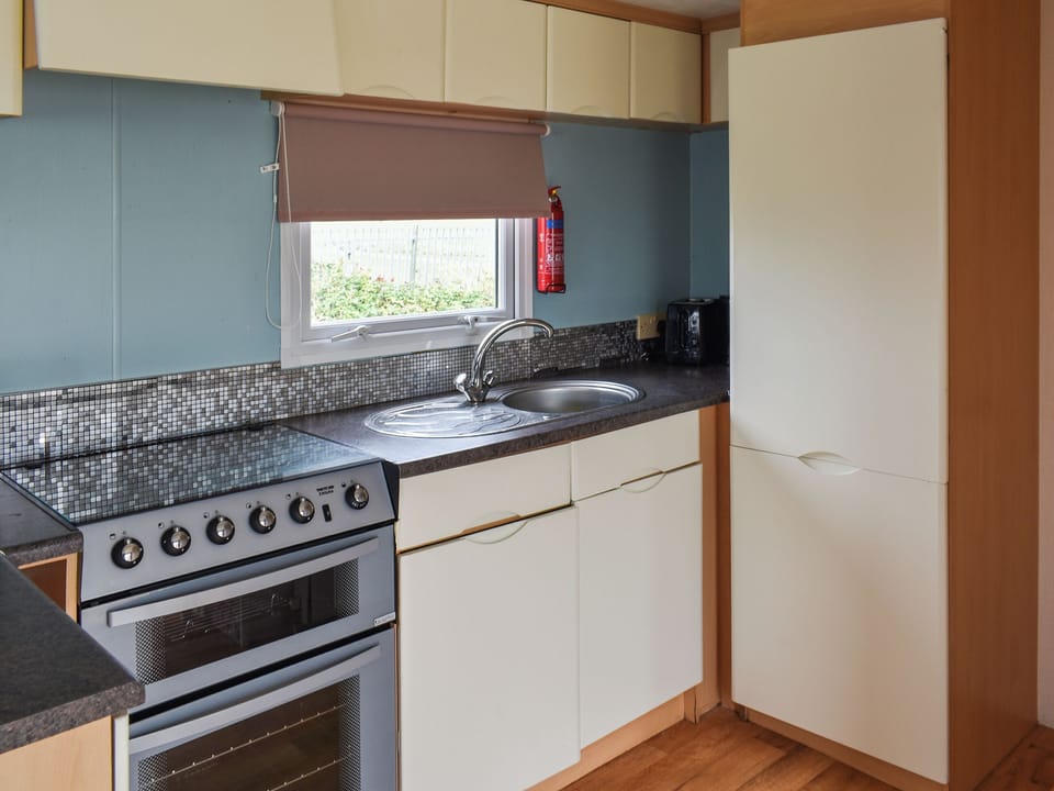 Living area | Praise Machine Caravan Experience, St Osyth