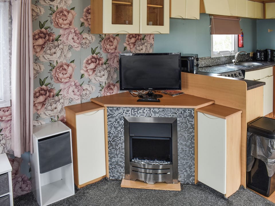 Living area | Praise Machine Caravan Experience, St Osyth