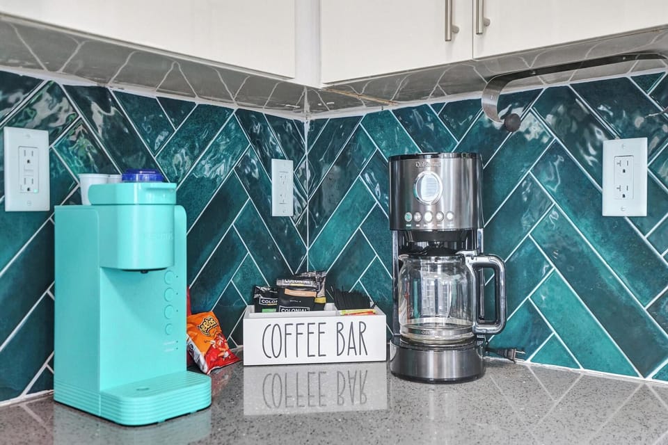 Coffee Bar: Brew your favorites in style with a vibrant coffee station and tasty treats nearby!