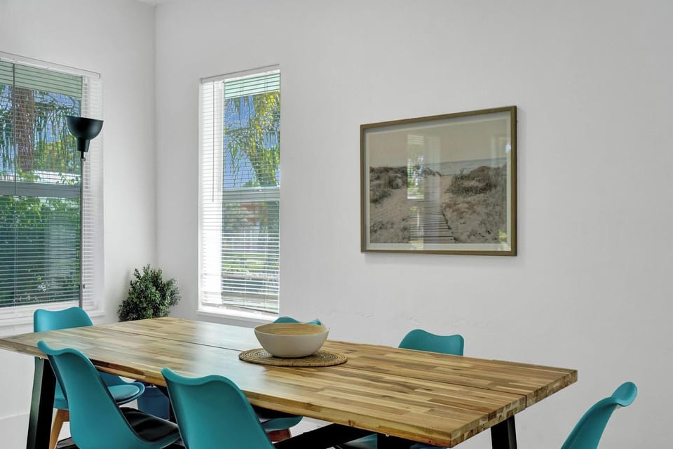 Dining Room: Bright space with modern decor, perfect for family meals and laughter-filled gatherings!