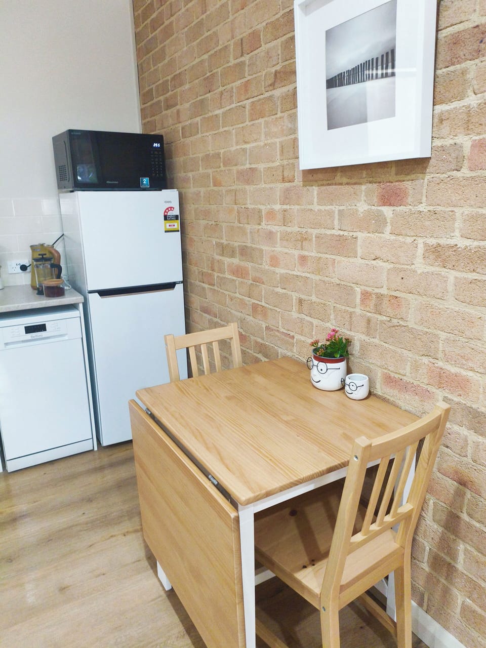 Fridge, freezer, dishwasher, table for two that extends to seat 4 people