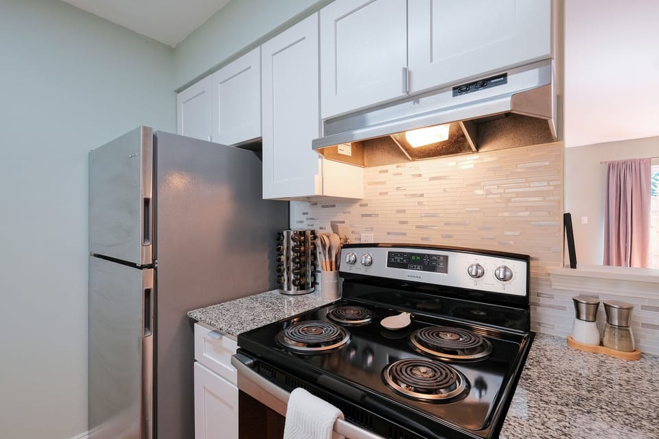Updated galley kitchen with Farmhouse sink