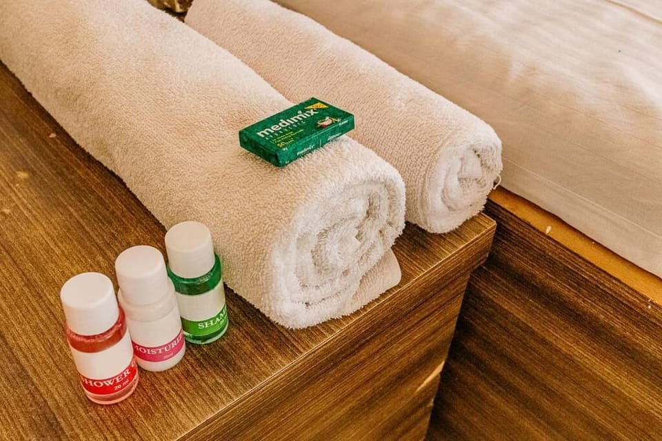 Shower, towels, soap, shampoo