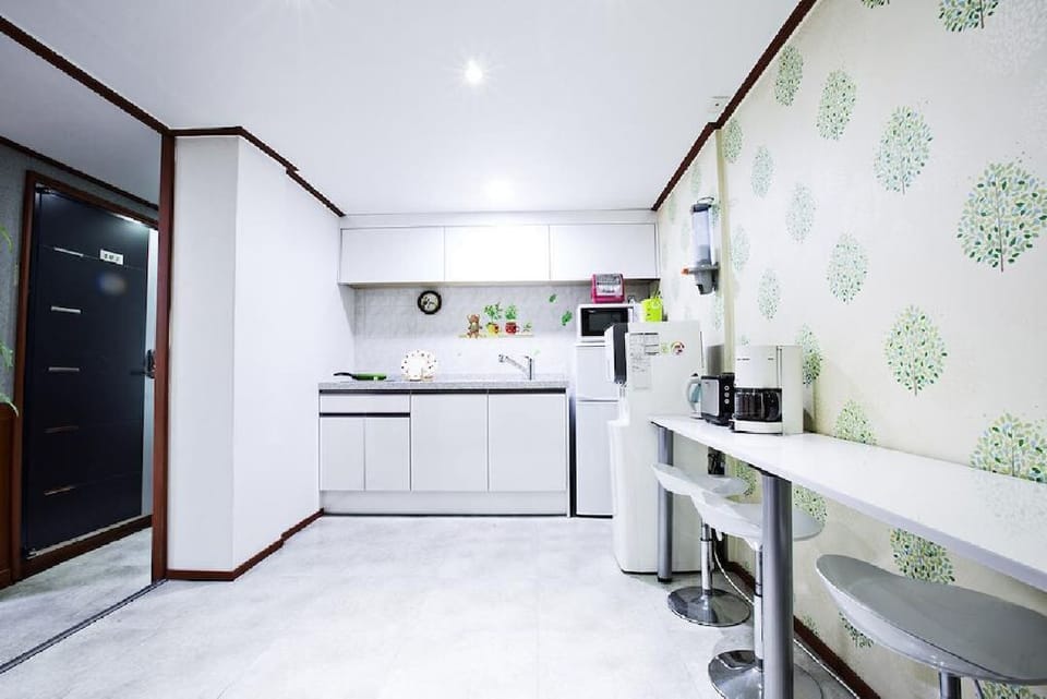 Fridge, microwave, electric kettle, cookware/dishes/utensils