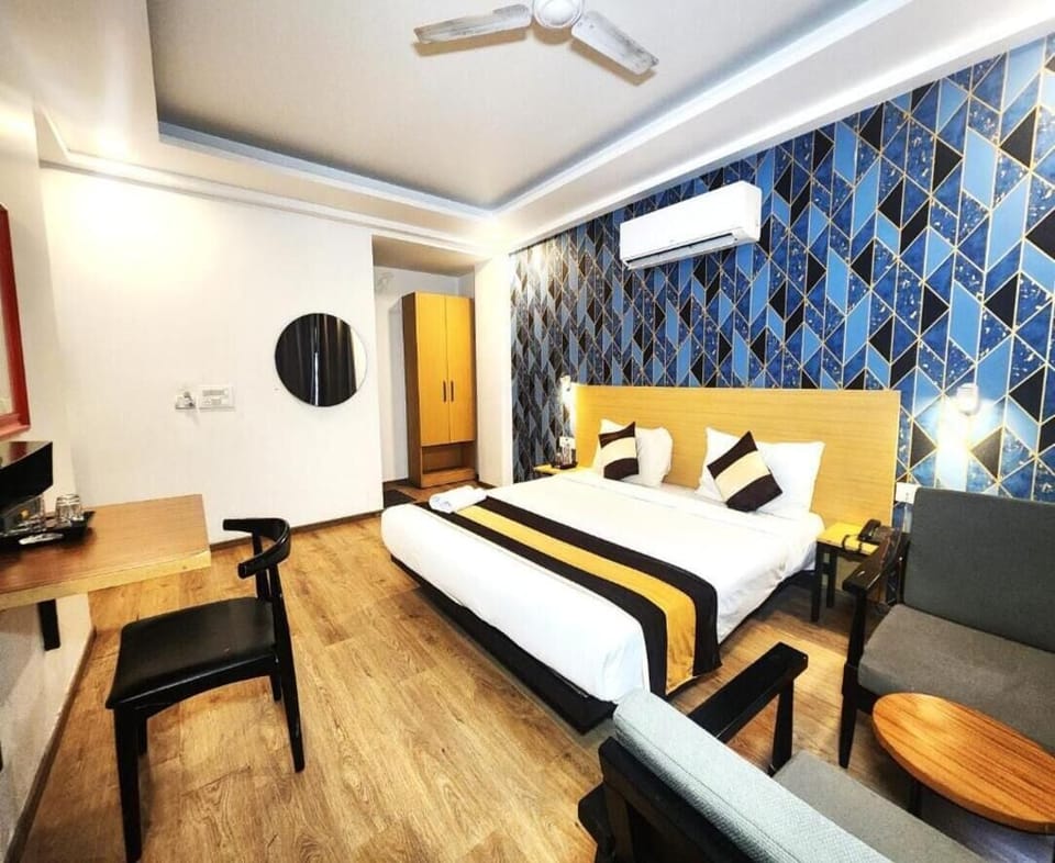 Deluxe Double Room, Balcony, City View | Desk, laptop workspace, free WiFi