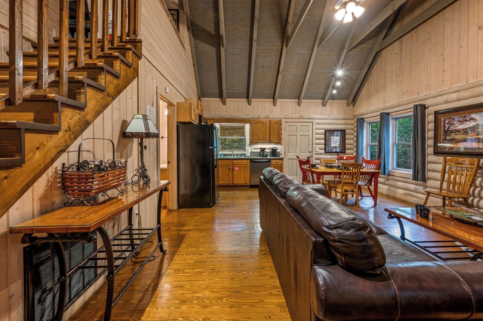 Rustic charm: open living, dining, and kitchen for your mountain escape.