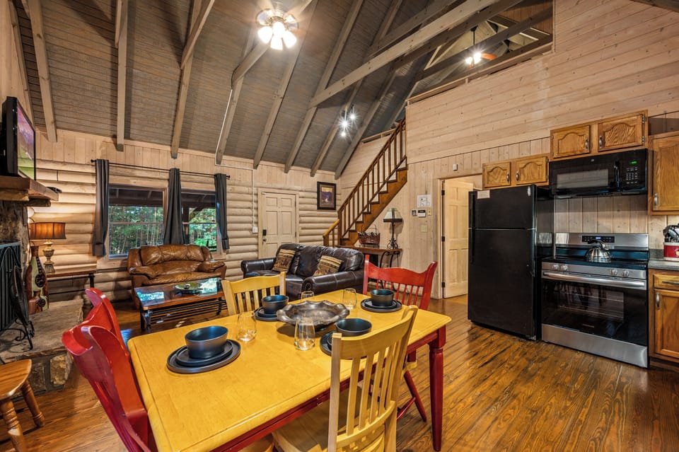 Gather here! Open-concept kitchen, dining, & living with fireplace.