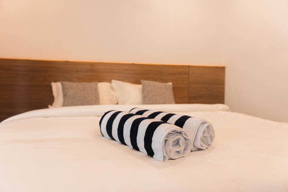 Deluxe Quadruple Room, Garden View | Desk, free WiFi