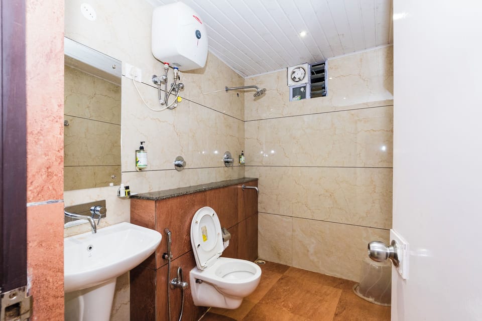 Shower, hair dryer (on request), slippers, towels