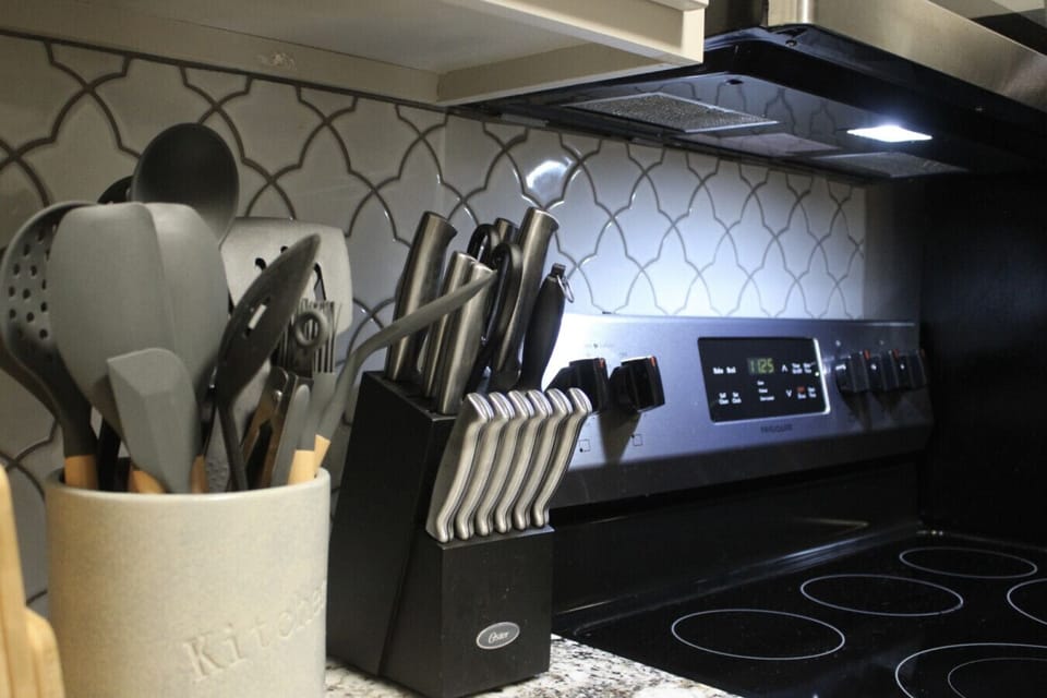 Cook up a storm with modern appliances and stylish tools—dinner awaits!