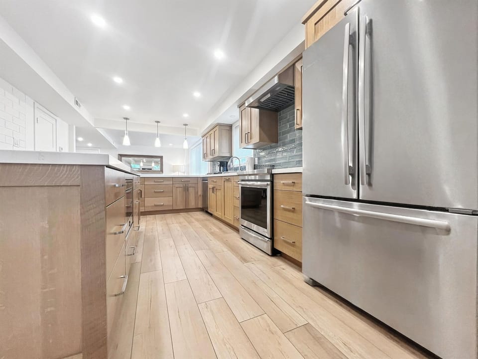 Bright kitchen with a spacious layout and sleek finishes.