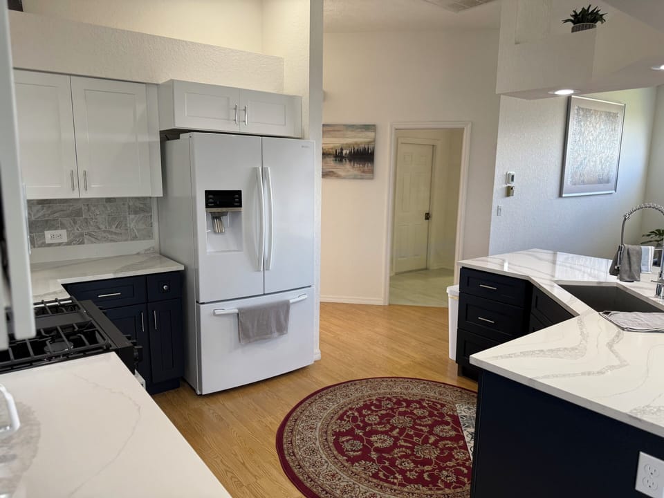 Open kitchen with five burner gas range