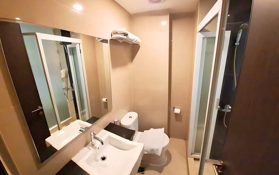Shower, slippers, towels, soap