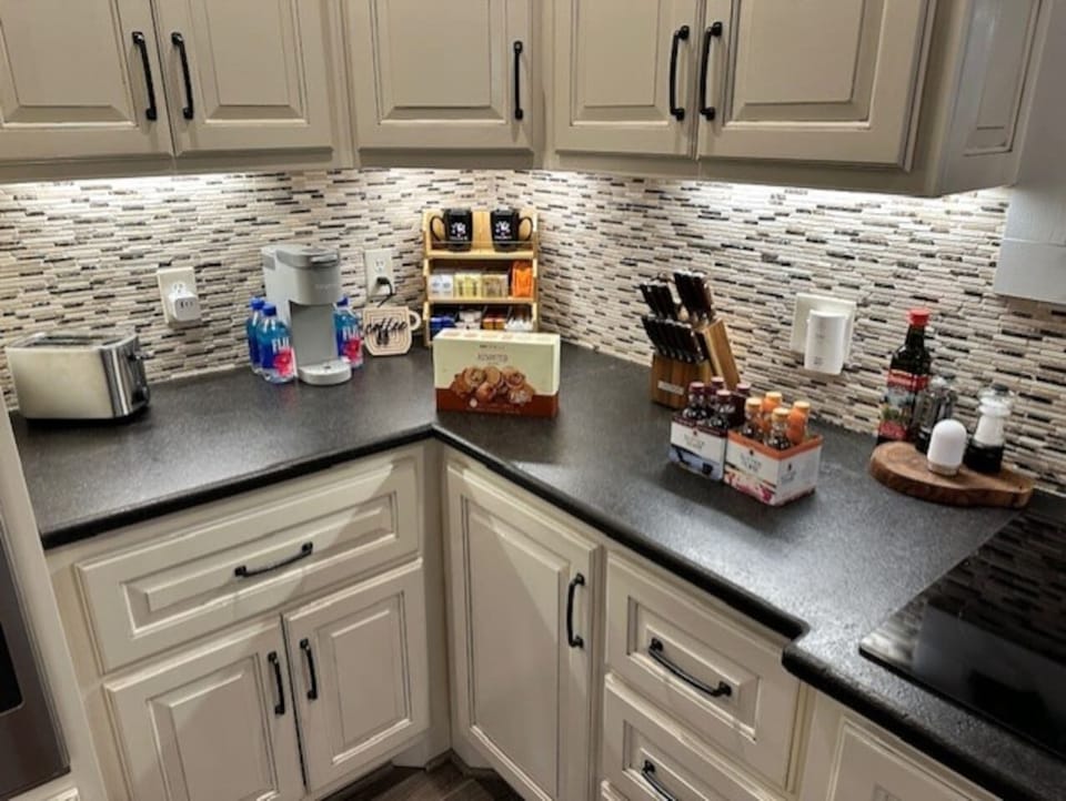 Enjoy a Hot cup of Coffee or Tea in a fully stocked coffee bar with all the fixings. 