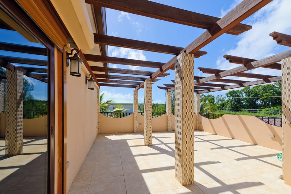 Large upper patio on front of house facing west for watching beautiful sunsets!