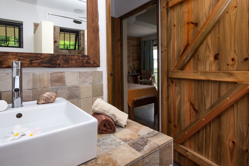 8.Superior Terrace Ocean and Pool View | Bathroom | Shower, free toiletries, towels