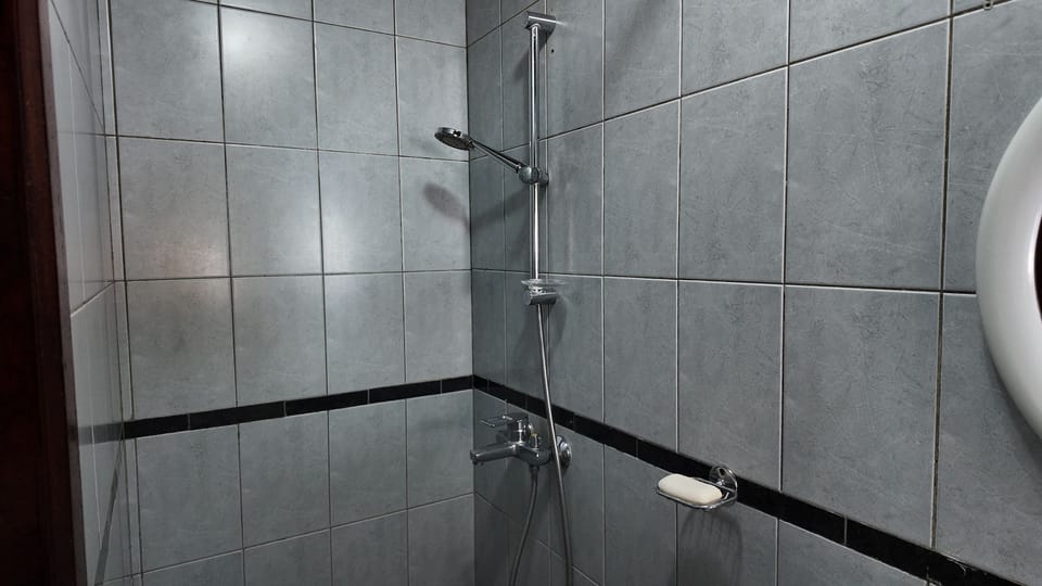 Double Room, Lanai, Garden View | Bathroom | Shower, towels, soap, toilet paper