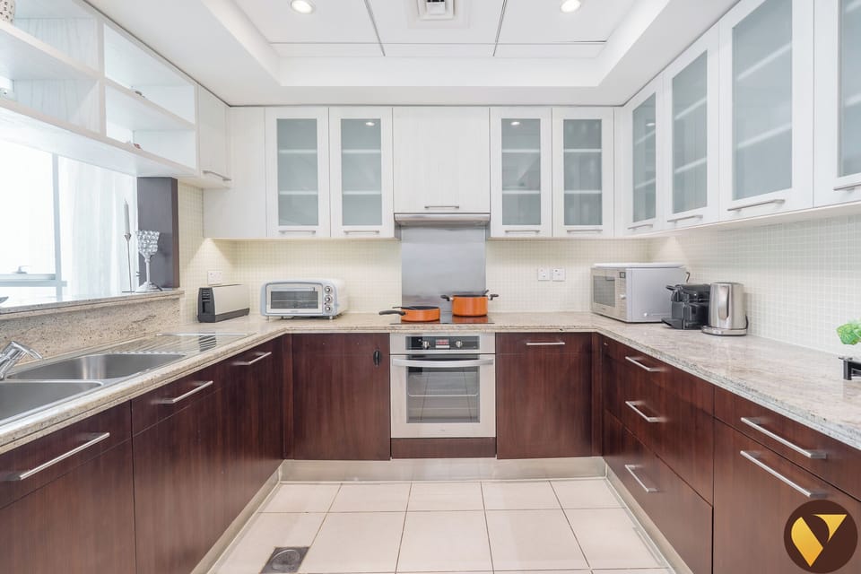 Luxury Apartment, Balcony, City View | Private kitchen | Full-size fridge, microwave, oven, stovetop
