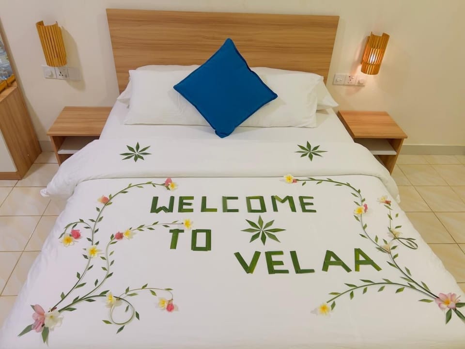 Family Quadruple Room, Garden View | Iron/ironing board, free WiFi