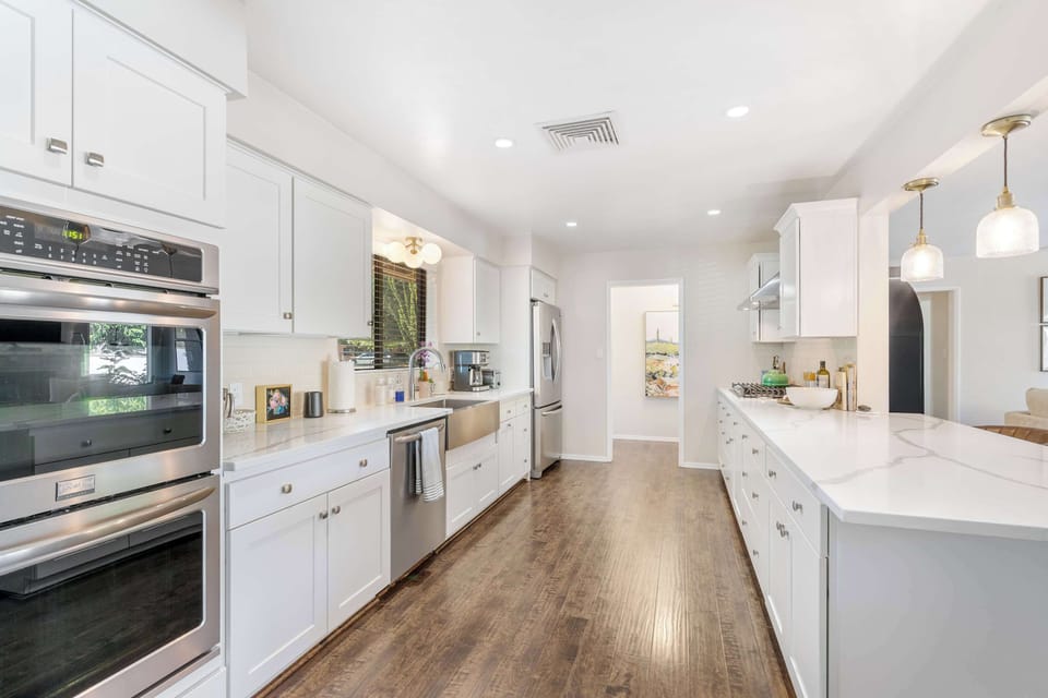 State-of-the-art kitchen with modern appliances, sleek countertops, and everything you need for gourmet cooking