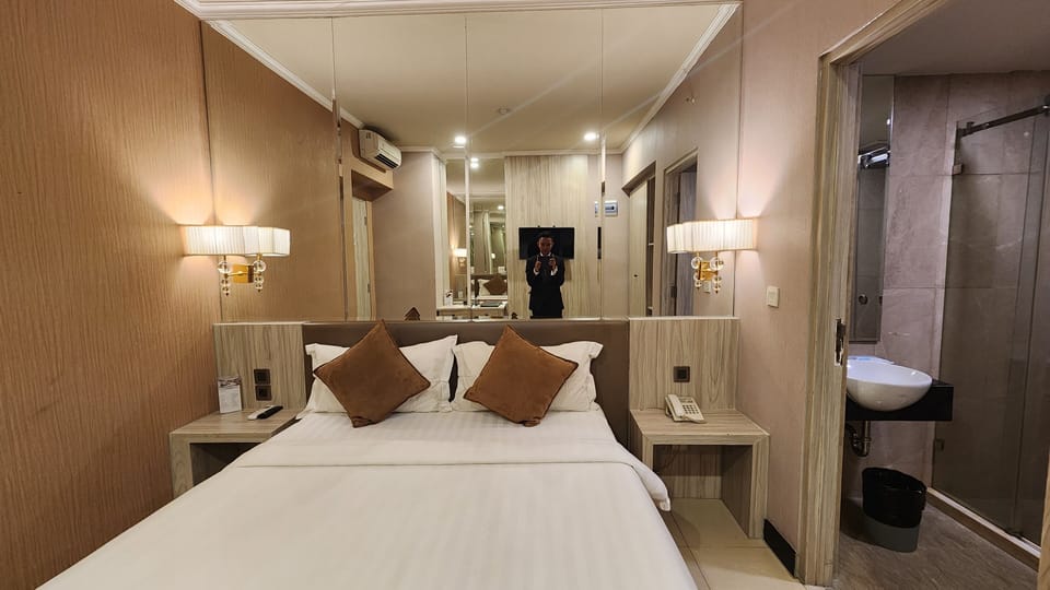 Superior Room | Minibar, in-room safe, individually decorated, desk