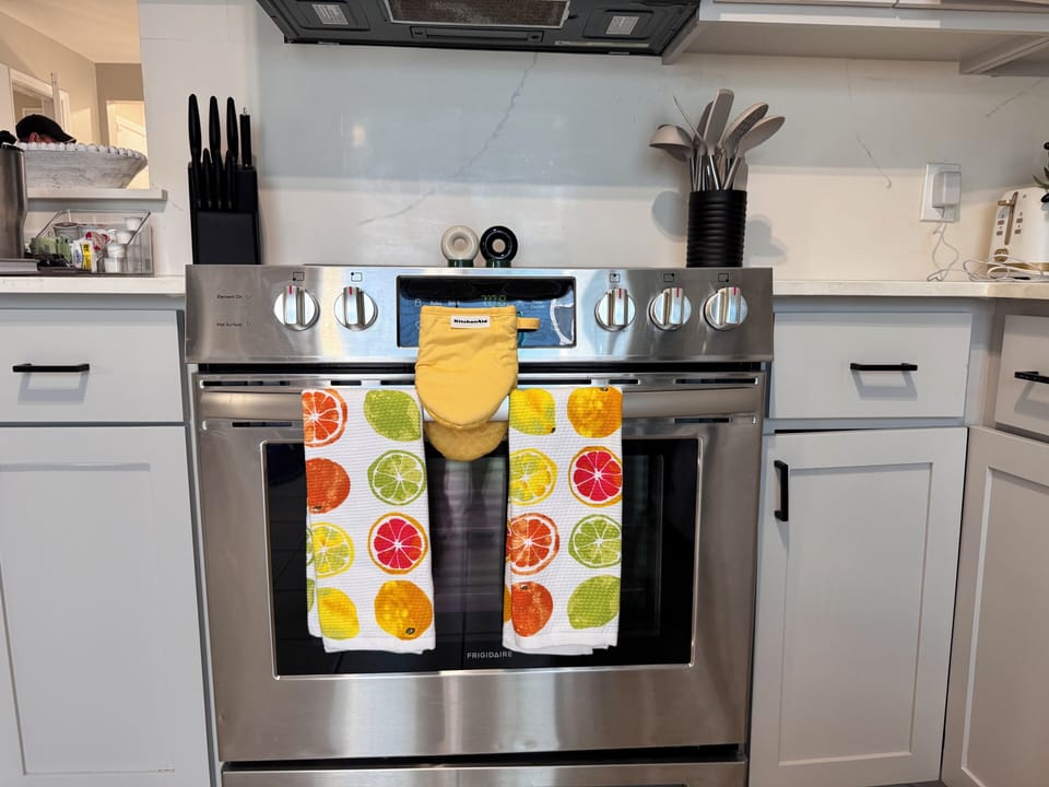 Full kitchen with stove top and oven combo