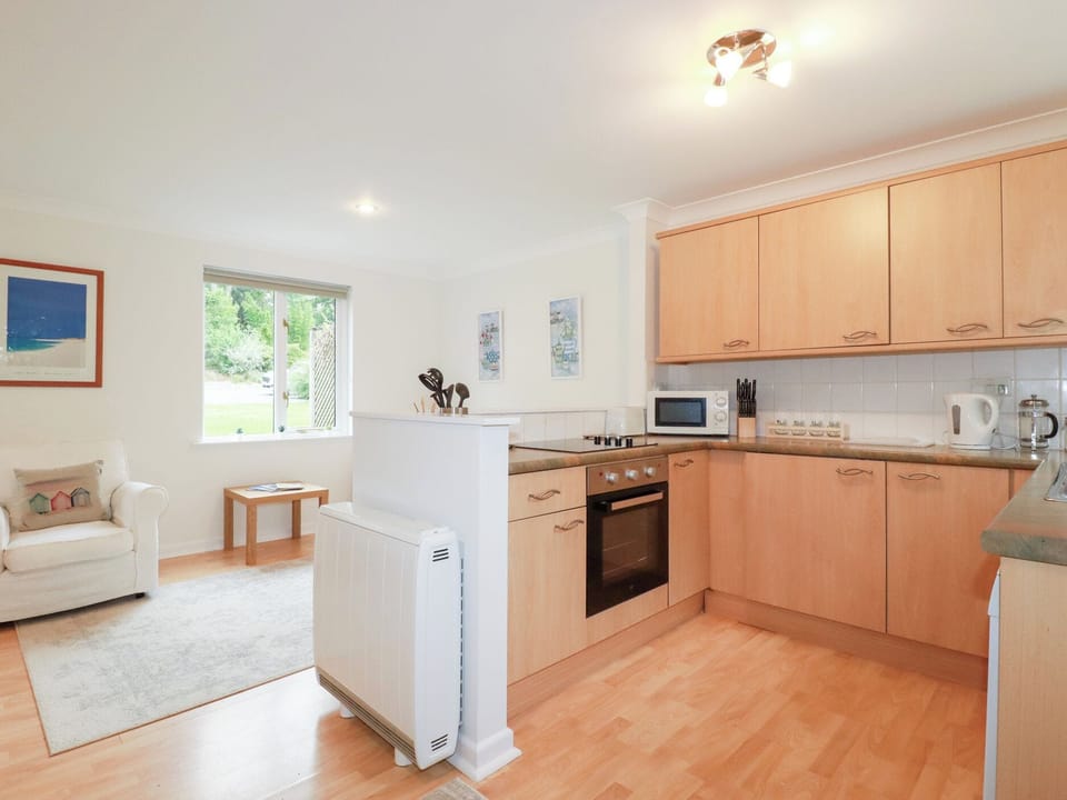 Fridge, microwave, toaster, cookware/dishes/utensils