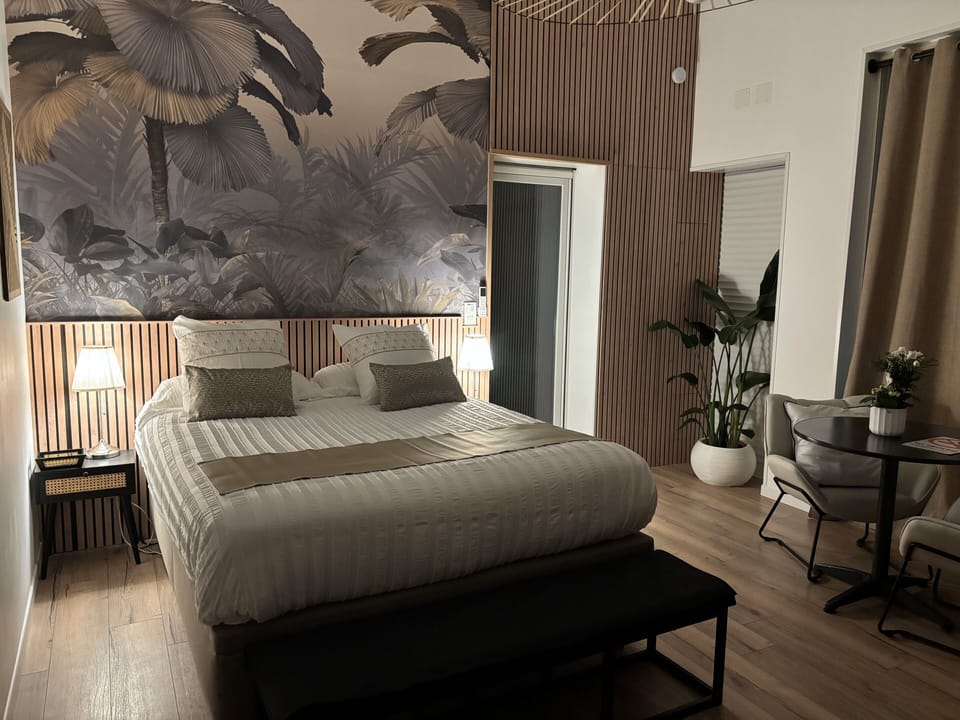 Superior Suite, Pool View | Blackout drapes, soundproofing, iron/ironing board, free WiFi