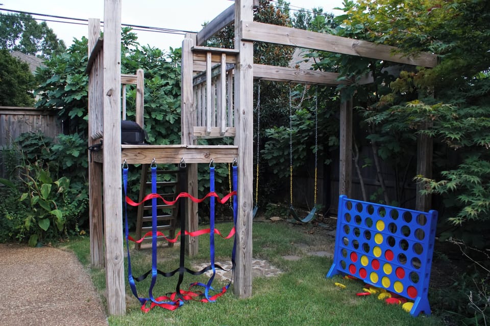 Let the kids play on the swing set and play life size games. Fun for everyone!