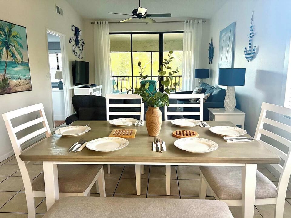Dining area for six plus 2 stools right behind at the counter 