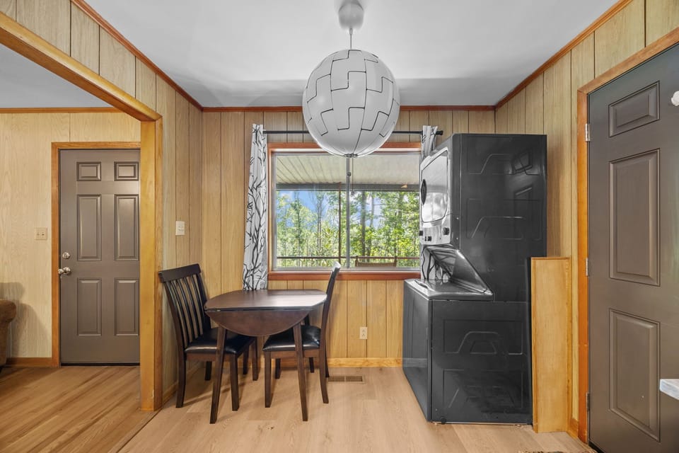 Lutheridge cabin breakfast nook with stackable washer and dryer