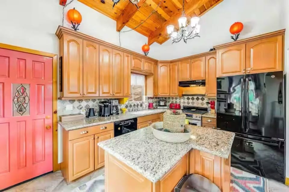 Bright, bold, and inviting—this retro-modern living space brings comfort and character together.