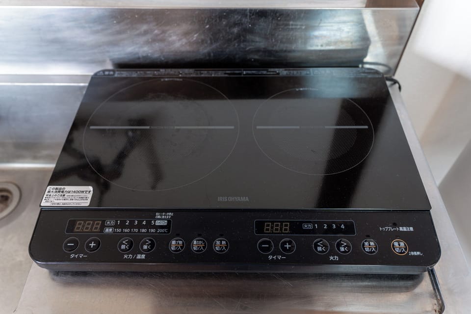 Full-size fridge, microwave, stovetop, electric kettle