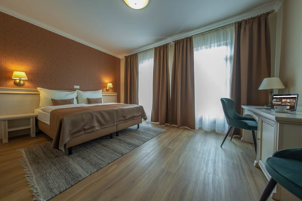 Blackout drapes, WiFi (free), bed sheets