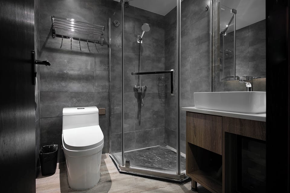 Shower, free toiletries, hair dryer, slippers