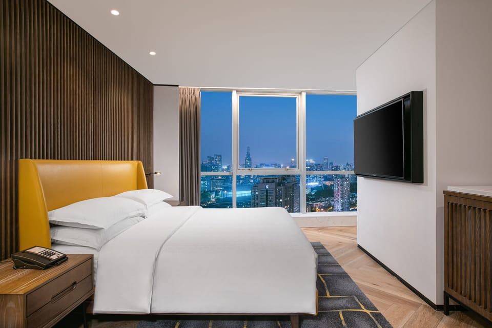 Grand Room | 1 bedroom, premium bedding, down comforters, minibar