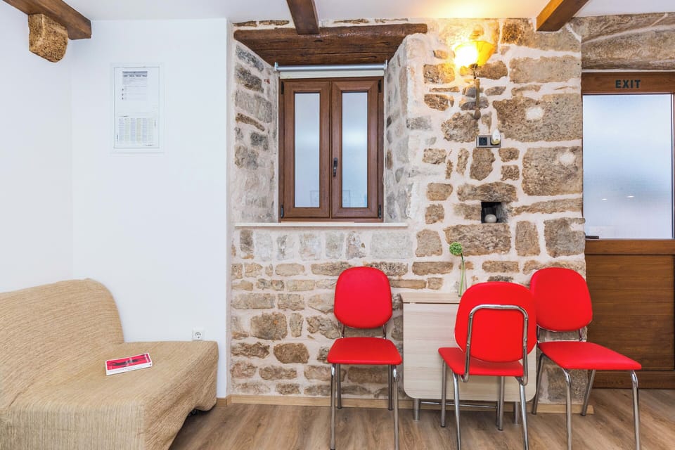 Studio | Living area | 26-inch flat-screen TV with cable channels