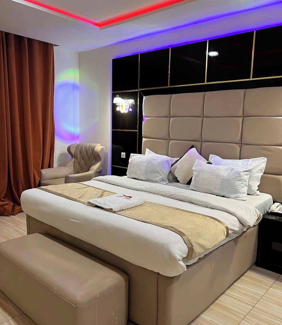 Deluxe Room, Balcony, City View | Desk, laptop workspace, blackout drapes, soundproofing