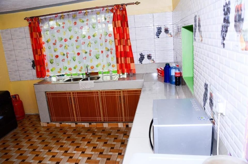 Family Bungalow, Balcony, Garden View | Private kitchen | Fridge, microwave, electric kettle, cookware/dishes/utensils