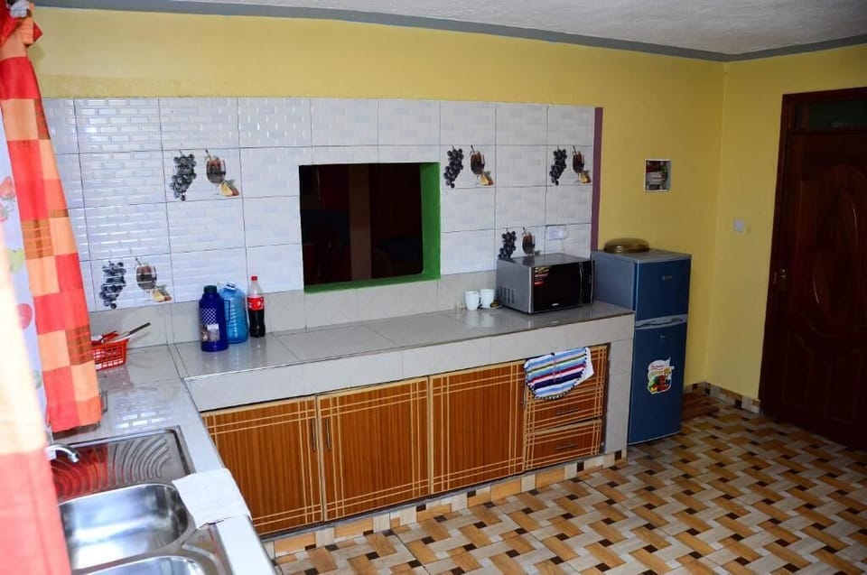 Family Bungalow, Balcony, Garden View | Private kitchen | Fridge, microwave, electric kettle, cookware/dishes/utensils